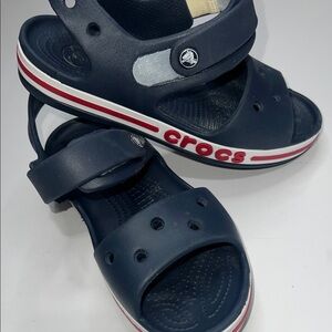 CROCS Kids Navy Blue Sandals with Red Accents